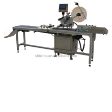 JT 210D automatic plastic bag labeling machine